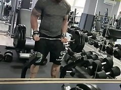 Muscle flexing gym