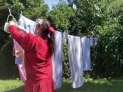 Dressed with a vintage dress to hang laundry outside