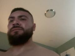 Hairy bearded man having sex