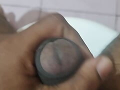 Indian black guy musterbation in toilet