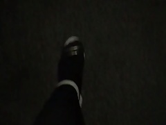 Shiny feet in strappy heels