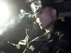 Smokin' in leather gloves and muir cap