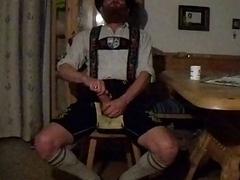 Man in lederhosen teases his achy prick