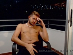 Horny Latino strokes off on his balcony while streaming on CAM4