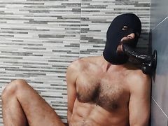 Masked daddy moaning and sucking dildo
