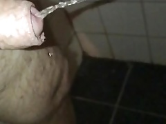 Fat guy with a small limp dick peeing in Sletten mo