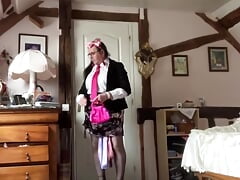 In a little floral skirt and fuchsia tie with stains for an evening