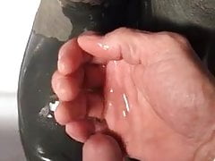 Pissing on mates wellies