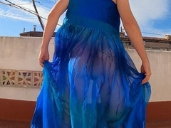 Sissy goddess in a see-through dress shows off her sexy cock and ass while having fun outdoors