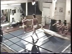 Two sexy men wrestle with wedgies in briefs