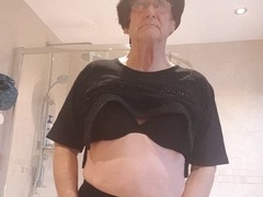 Mature strips in bathroom