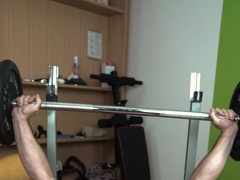 Molten fit dude does bench presses with a spear and finishes off all over his six pack later!