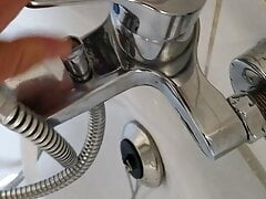 Sucking dick with vacuum cleaner and shower