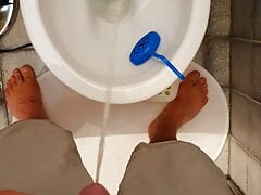Master Ramon pisses in short shorts in the slave toilet