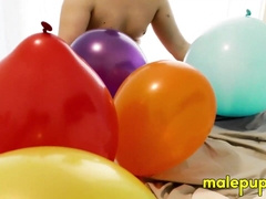 Elix Ataxx rubs the balloon over his body while rubbing dick around his playmates
