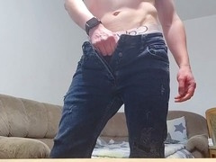Young dude in jeans strokes his massive 20 cm cock