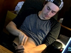 Toned Ty Evans wanks his hard-on off in front of his computer