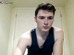 Skinny hottie Neal Peterson cums happily in a free porn vid