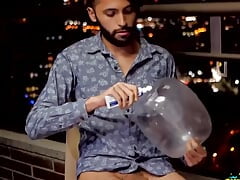 Fucking a condom out in the balcony until i cum inside of it