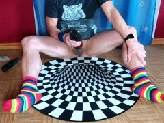 Colorful sock punk guy has fun with a massager and electric fleshlight
