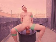 Axel Abysse with tattoos penetrates fake dick after anal foreplay