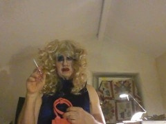 Crossdressing sissy gets humiliated and smokes while being called a fag slut