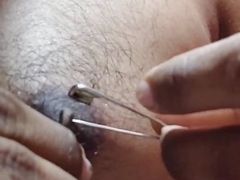 Man piercing  nipple and torture