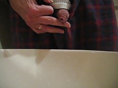 My little willy doing a pee in the bathroom sink