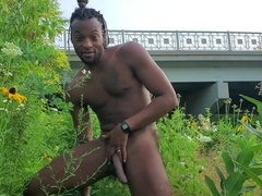 KennieJai masturbates off by the sea and gets caught