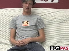 Adorable gay guy Danny jerks off his dick on couch solo