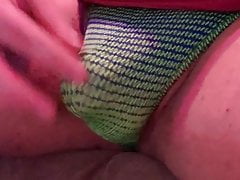 Playing with my bulge in a green and blue man thong