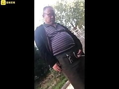 Peeing Cinese Man