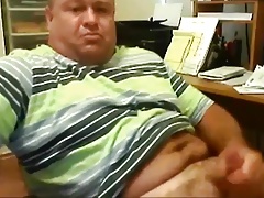 Chunky daddy stroking at office