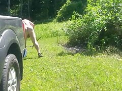 Old man works in yard