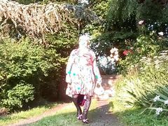 Dressed with a pleated floral dress for a night out