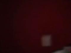 Two guys take their load of in a factory