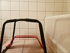 Riding on sex stool.