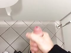 Cock jerked off in public toilet
