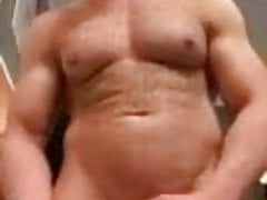 MUSCLE STUD PLAYS WITH HIS MASSIVE COCK