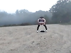 Sandy undresses on dirt road
