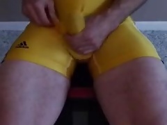 Dad jacks off in a wrestling singlet