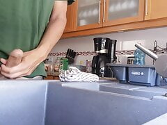 Hot guy jerks off into the kitchen sink