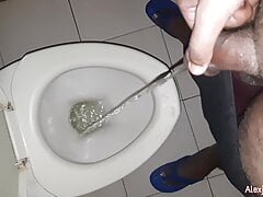 Guy pee and teasing cock