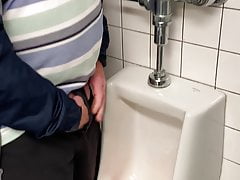 Peeing in public restroom