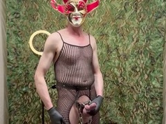 Masturbating alone in fishnet stockings and cock ring