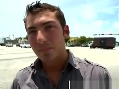Boy caresses a cock on the streets
