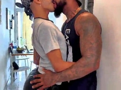 Black stud with a ginormous man sausage spilling milk on the white stud.