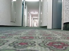 Hotel hall - naked and with clamps at dick