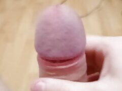 Young guy jerking off his hard cock