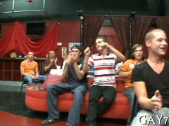 Watch a big-cocked stripper helping a young boy with his first gay experience